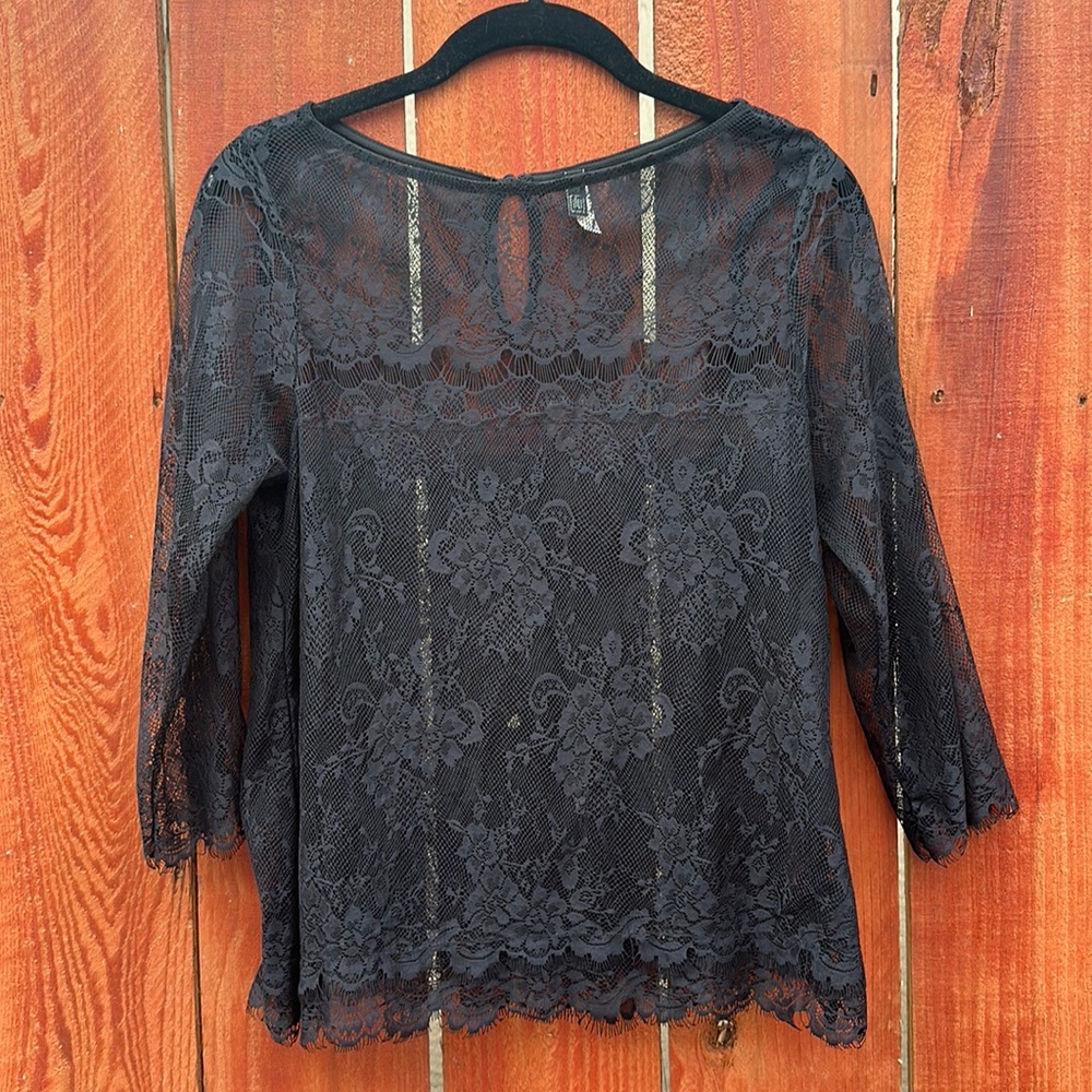 The limited top. Black size small, sheer, 3/4 sleeves. Used /good condition.